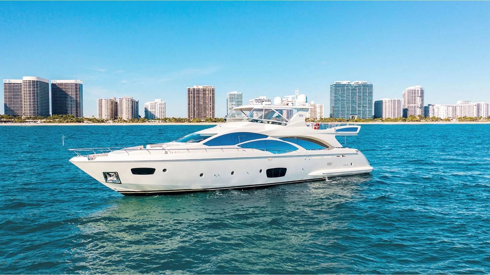 a white yacht in the water aboard BT2 Yacht for Sale