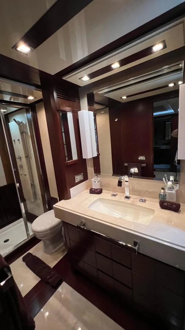 a bathroom with a sink and toilet aboard BT2 Yacht for Sale