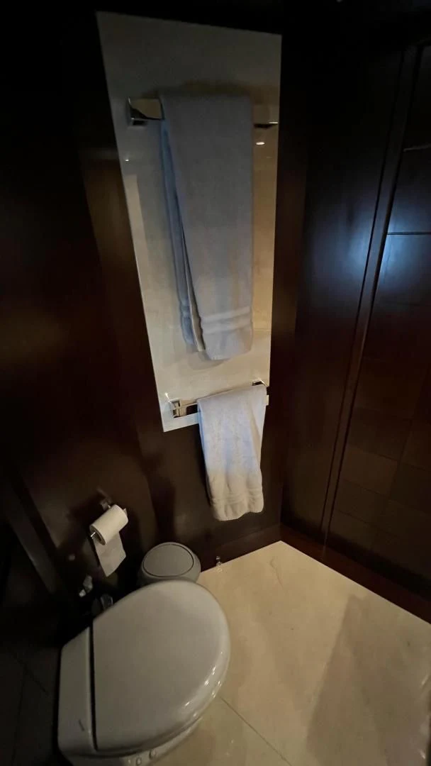 a towel over a toilet aboard BT2 Yacht for Sale