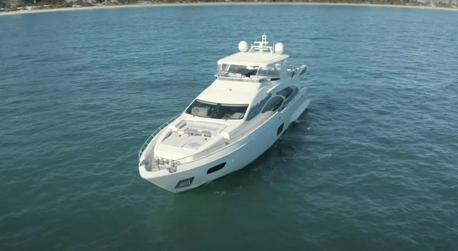 a white boat in the water aboard BT2 Yacht for Sale