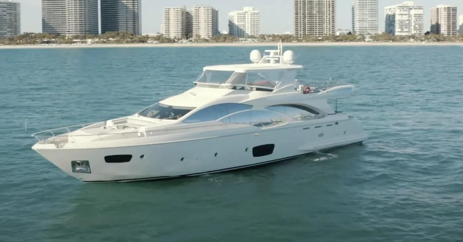 a white yacht in the water aboard BT2 Yacht for Sale