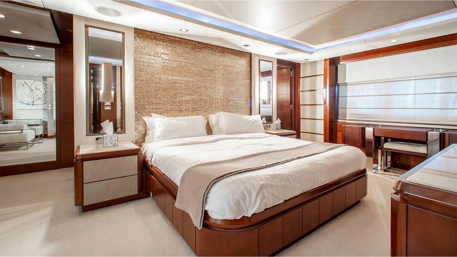 a large bedroom with a large bed aboard BT2 Yacht for Sale