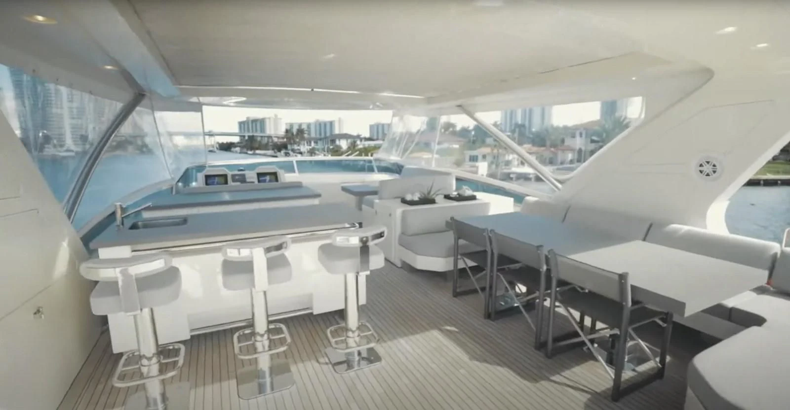 a room with tables and chairs aboard BT2 Yacht for Sale
