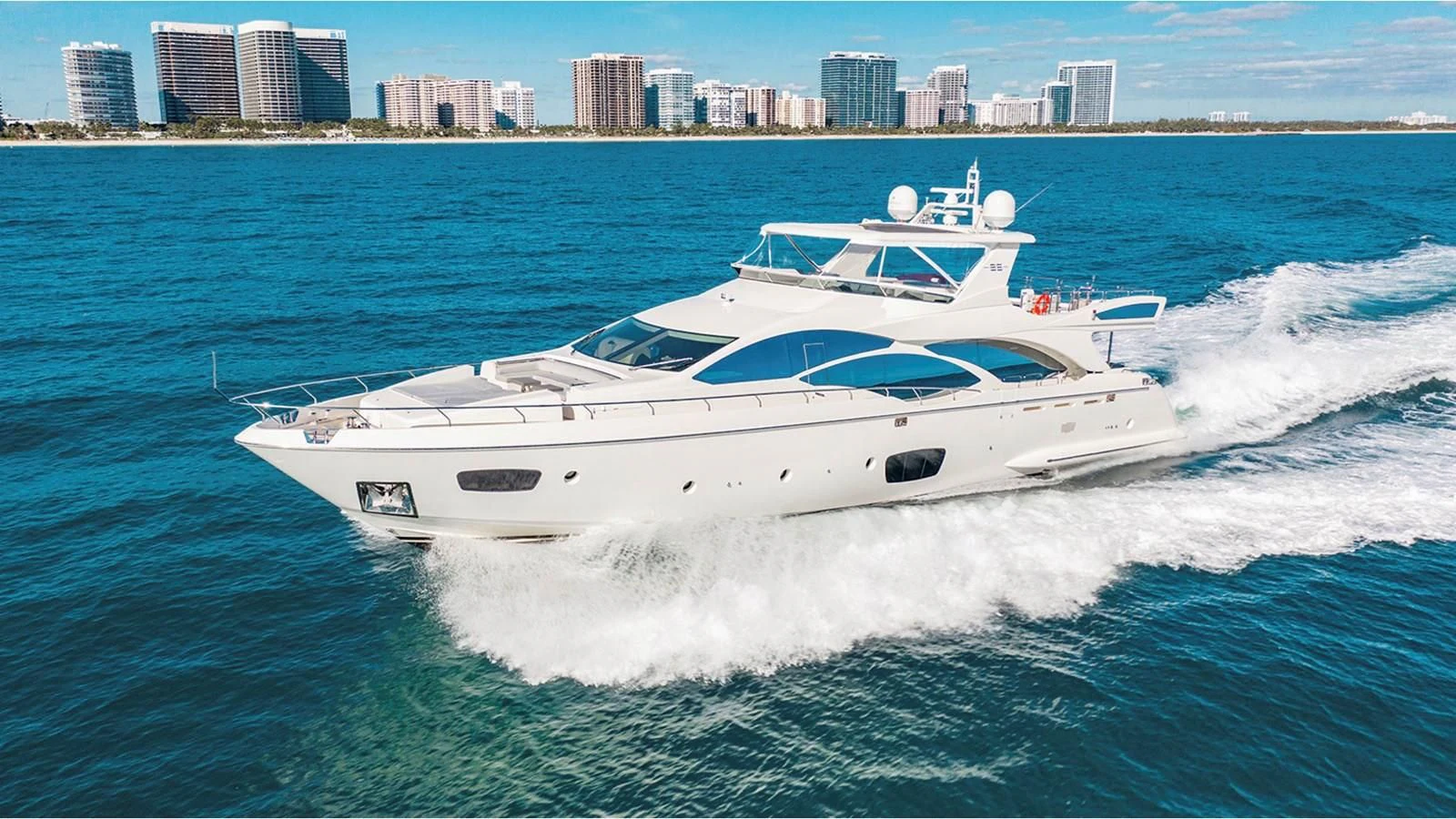 a white yacht on the water aboard BT2 Yacht for Sale