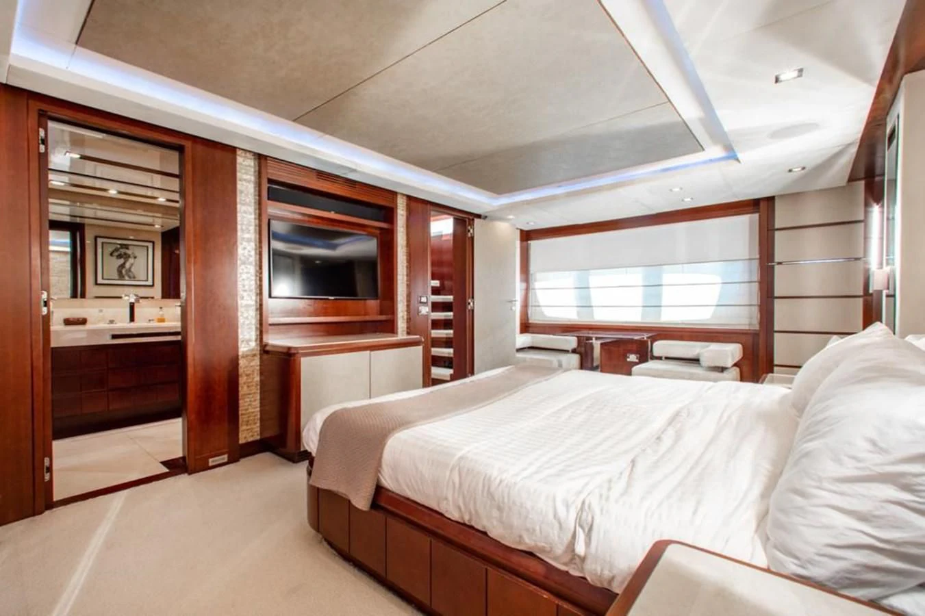 a room with a bed and a window aboard BT2 Yacht for Sale