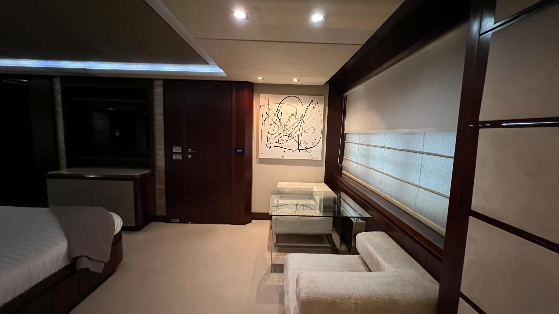 a room with a bed and a desk aboard BT2 Yacht for Sale