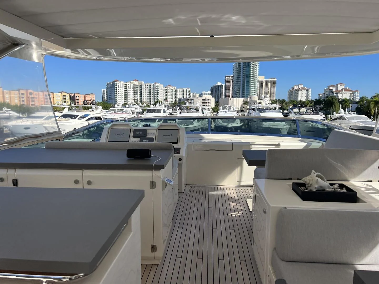 a room with a view of a city and a large body of water aboard BT2 Yacht for Sale