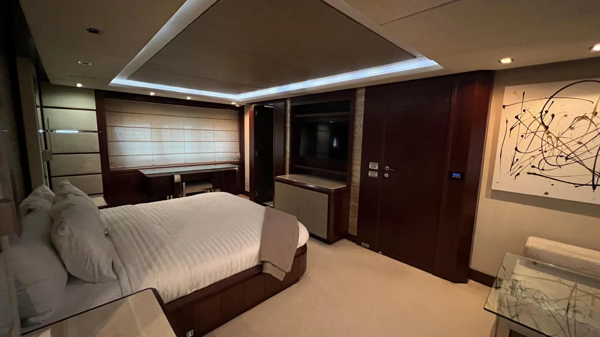 a room with a bed and a desk aboard BT2 Yacht for Sale