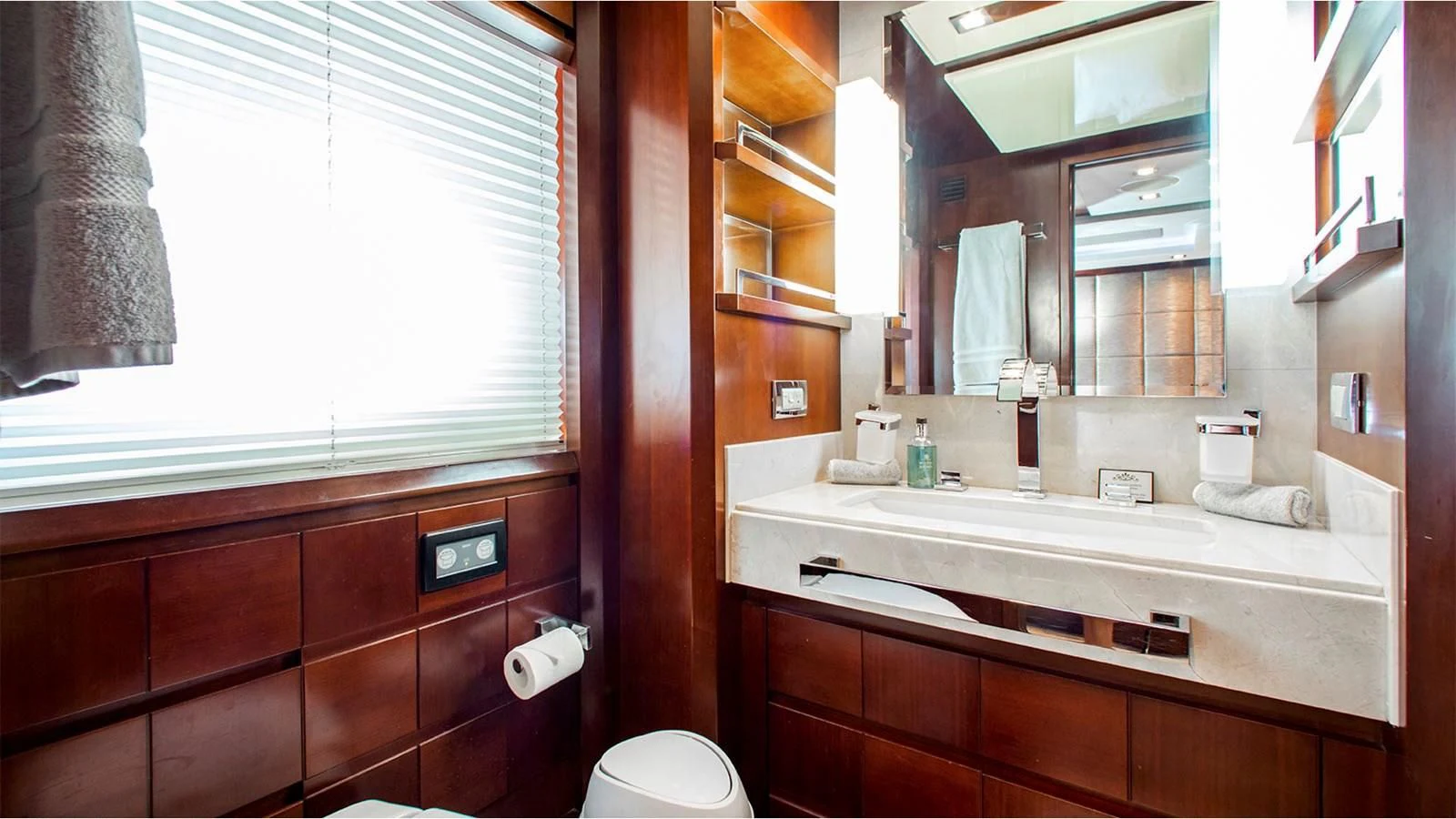 a bathroom with a large mirror aboard BT2 Yacht for Sale