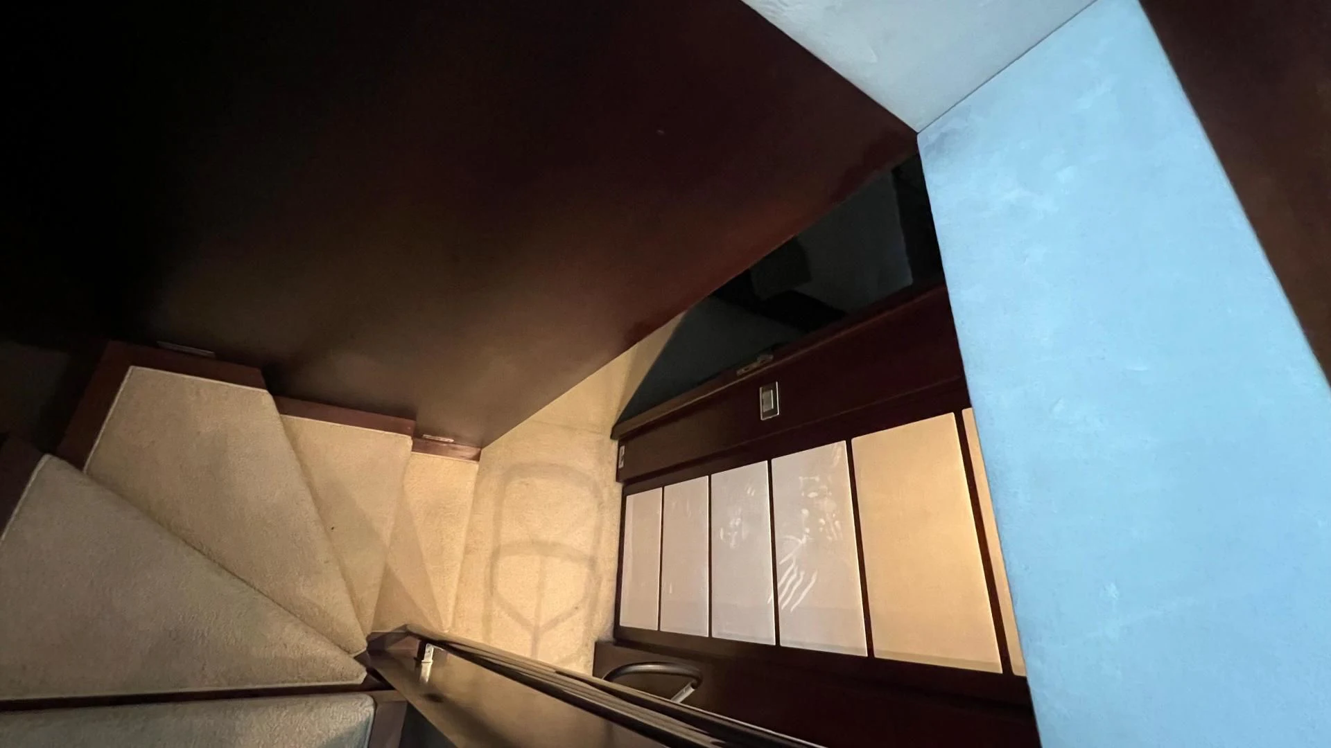 a room with a bed and a lamp aboard BT2 Yacht for Sale