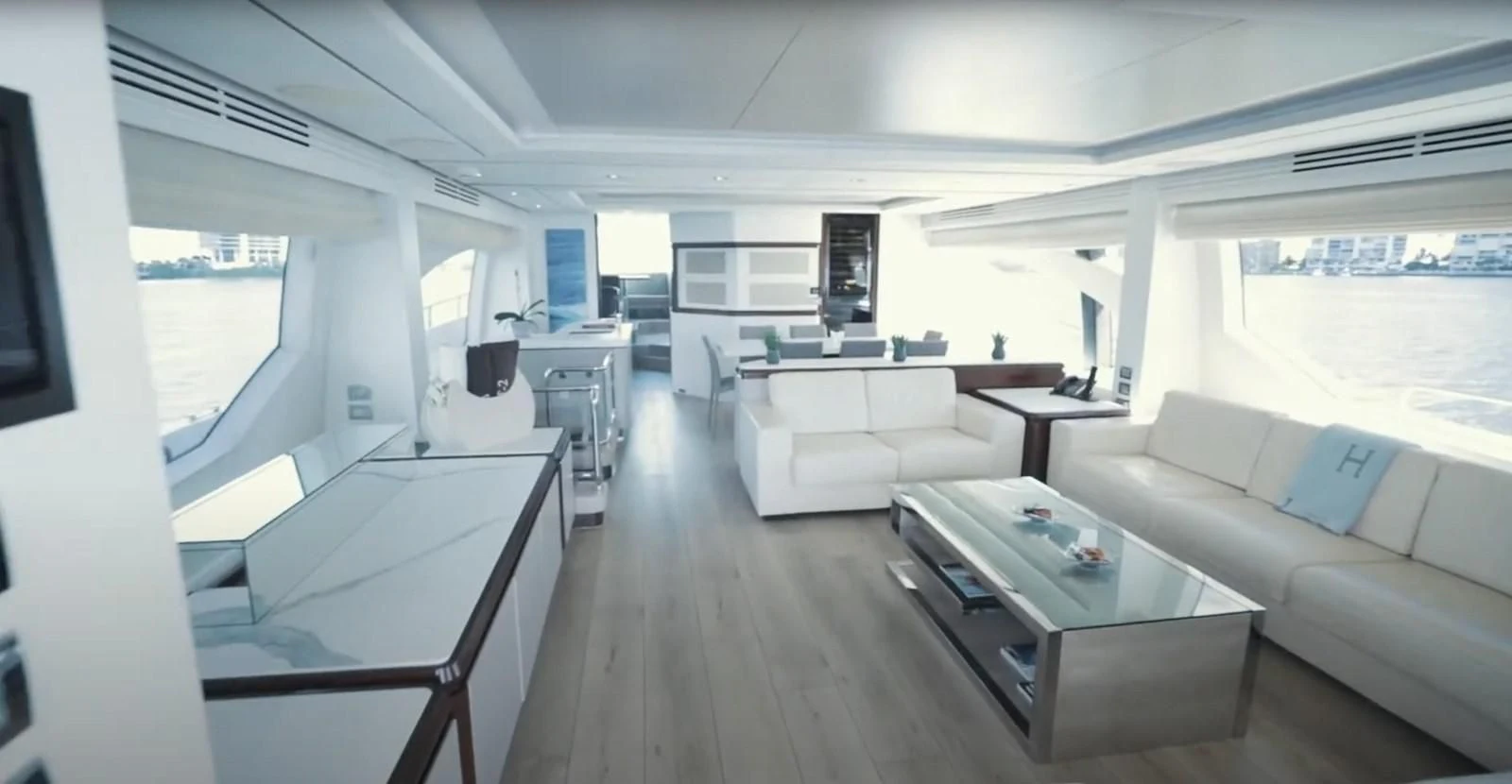 a living room with a couch and a table aboard BT2 Yacht for Sale