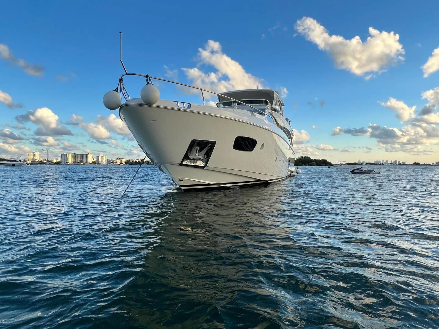 a white boat on the water aboard BT2 Yacht for Sale