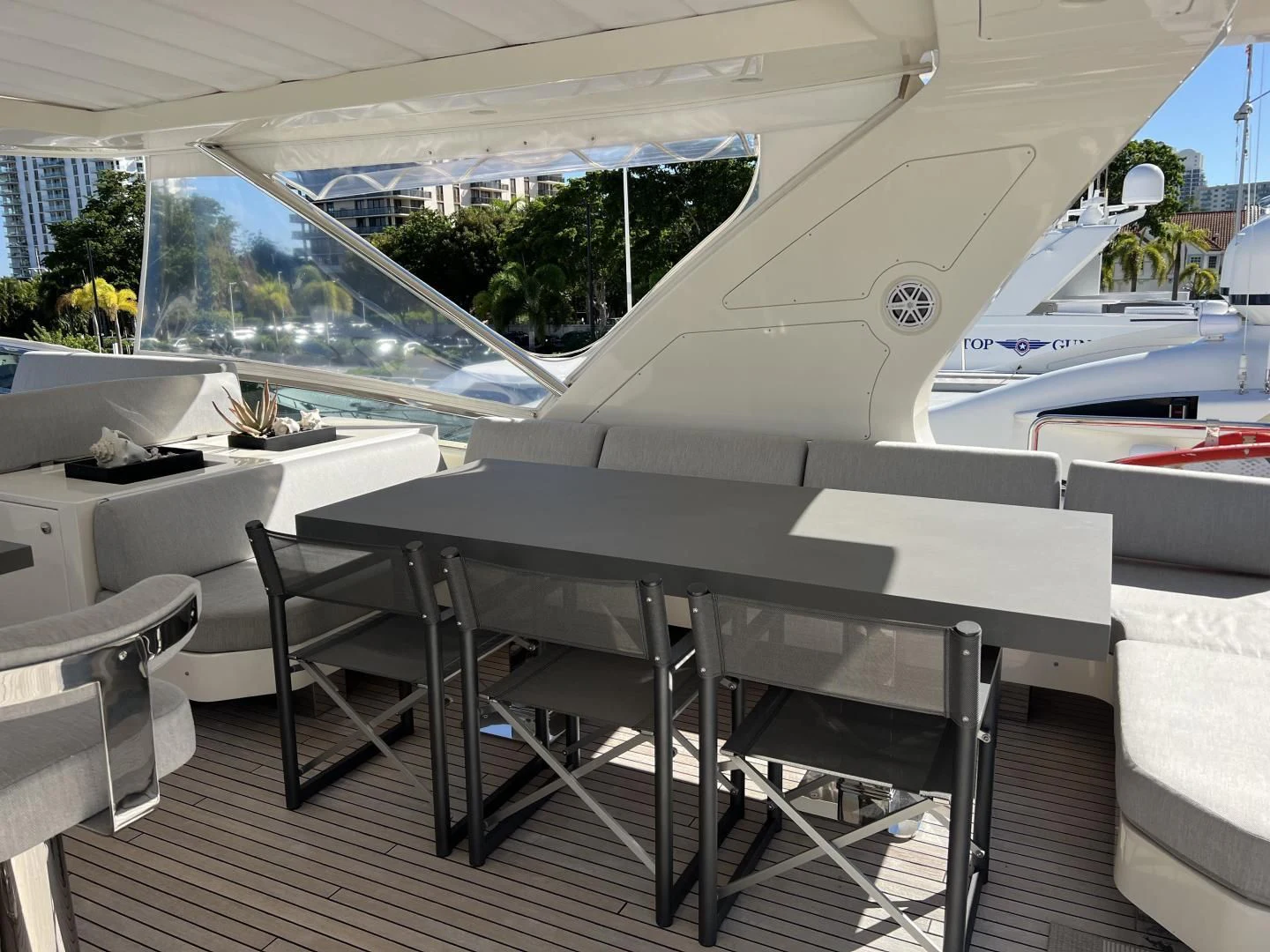 a room with a table and chairs aboard BT2 Yacht for Sale