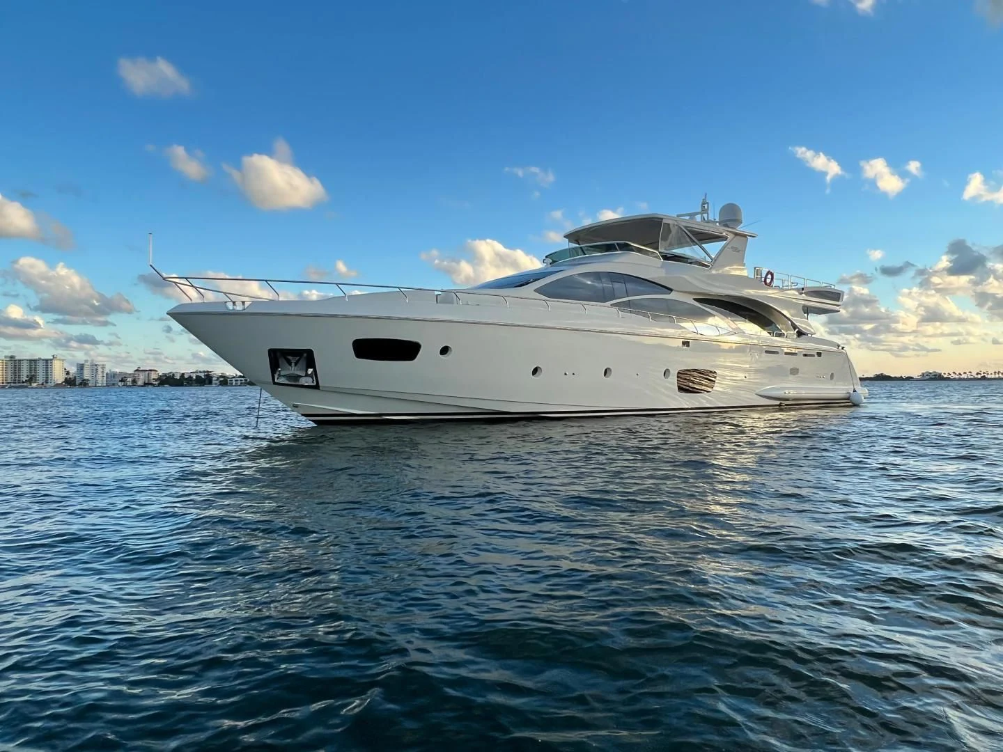 a white yacht in the water aboard BT2 Yacht for Sale