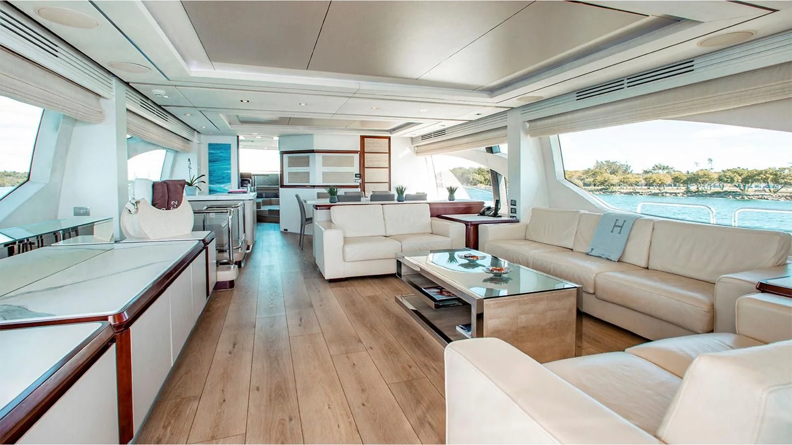 a living room with a large window aboard BT2 Yacht for Sale
