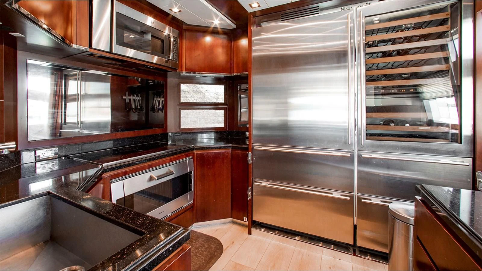a kitchen with a large glass door aboard BT2 Yacht for Sale