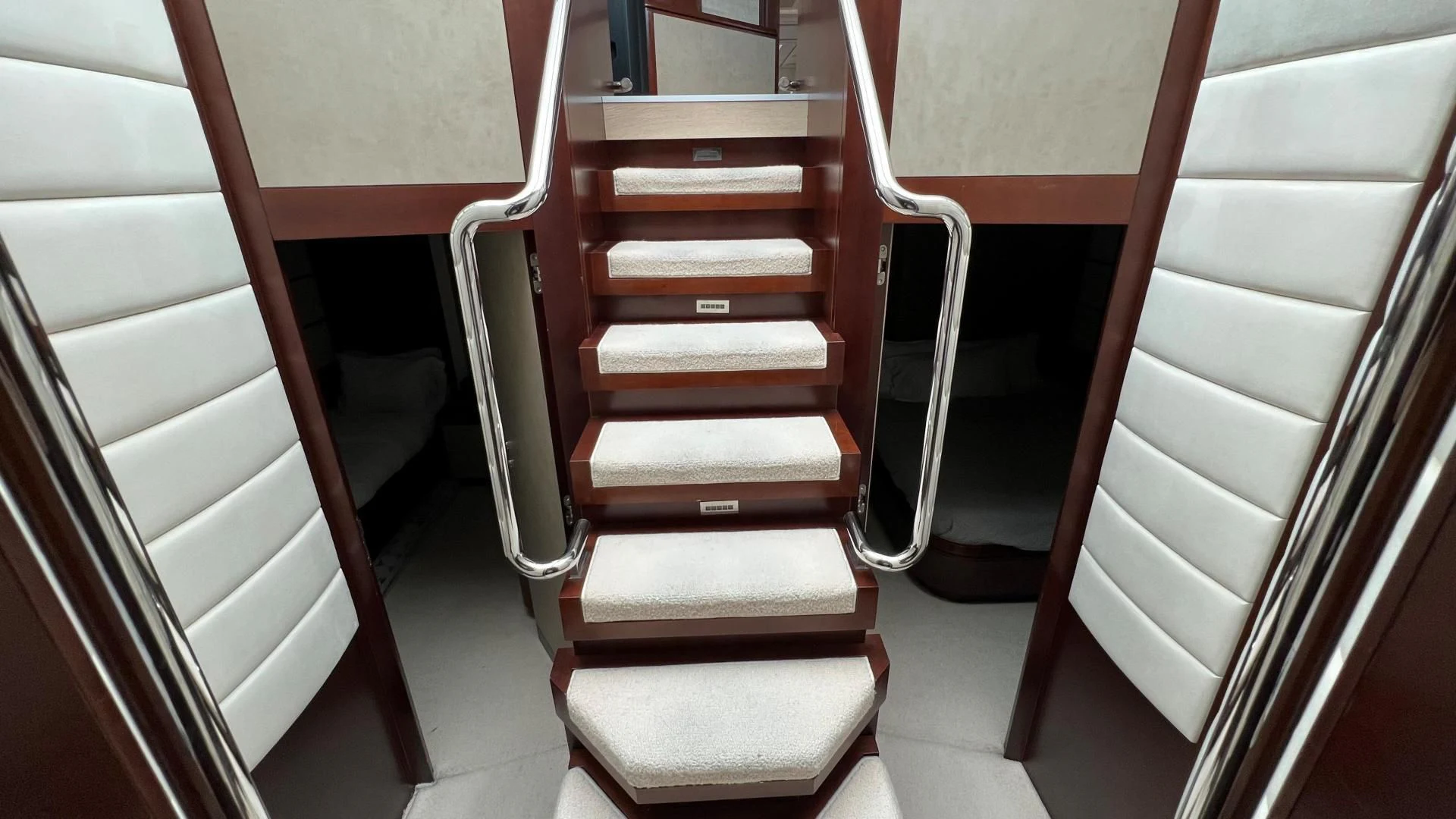 a red and white staircase aboard BT2 Yacht for Sale