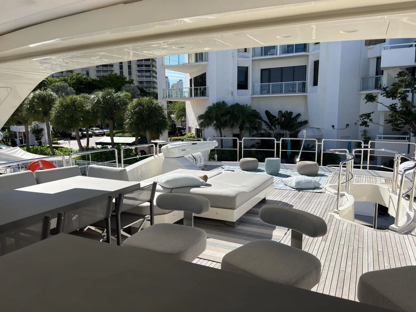 a room with tables and chairs aboard BT2 Yacht for Sale