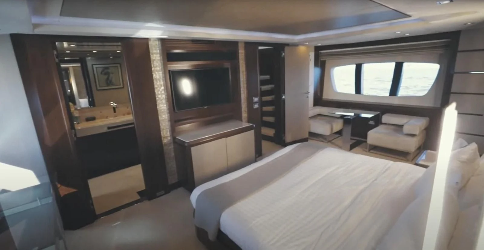 a room with a bed and a tv aboard BT2 Yacht for Sale