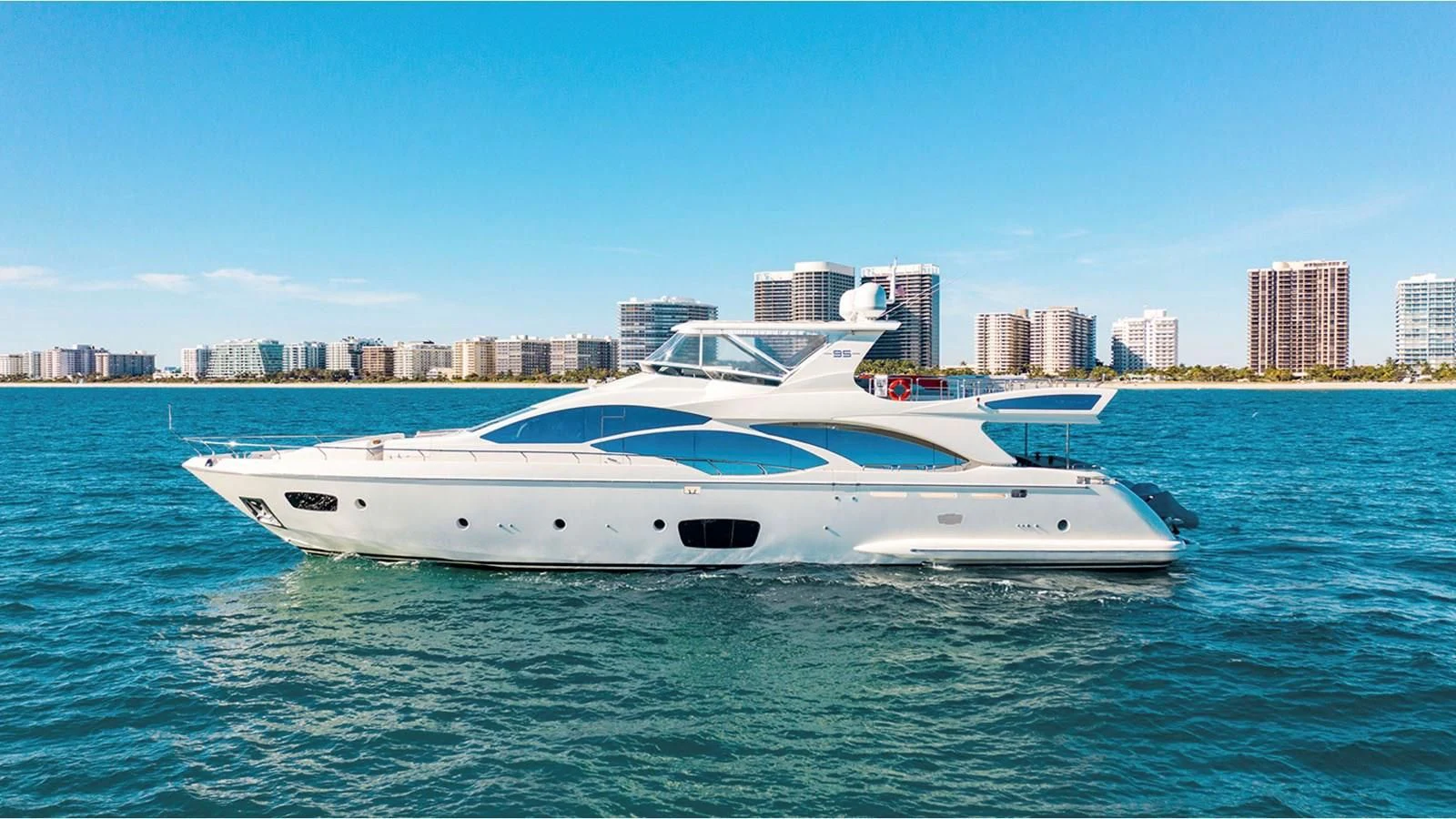 a white yacht in the water aboard BT2 Yacht for Sale