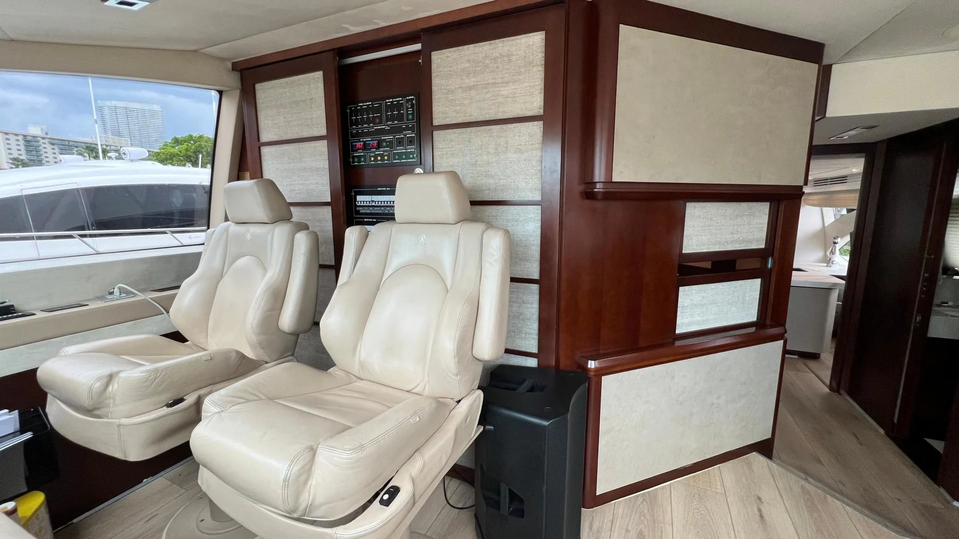 a room with chairs and a table aboard BT2 Yacht for Sale
