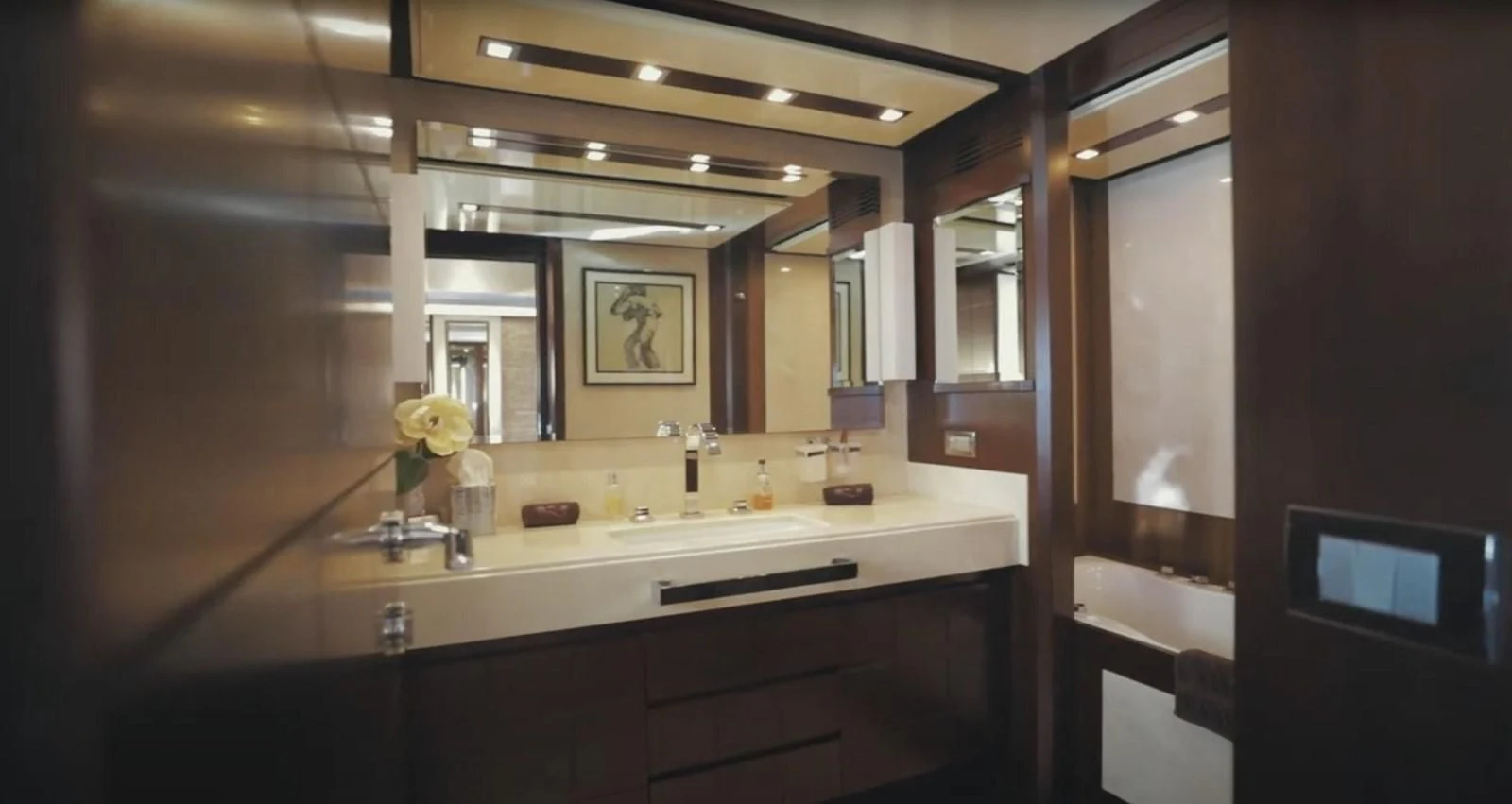 a bathroom with a sink and a mirror aboard BT2 Yacht for Sale