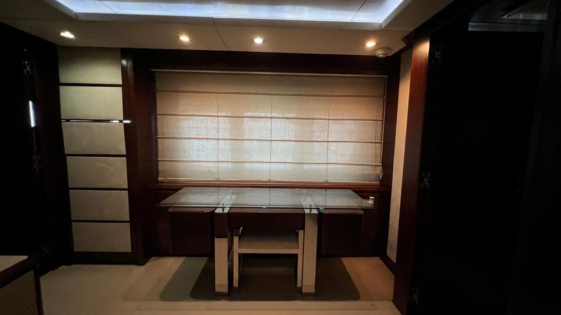 a room with a table and chairs aboard BT2 Yacht for Sale