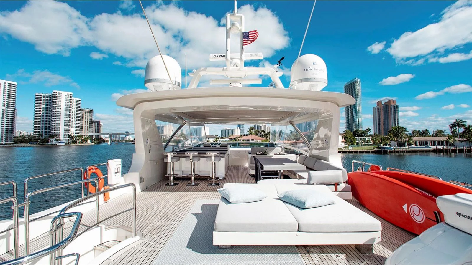 a large white boat on a dock aboard BT2 Yacht for Sale
