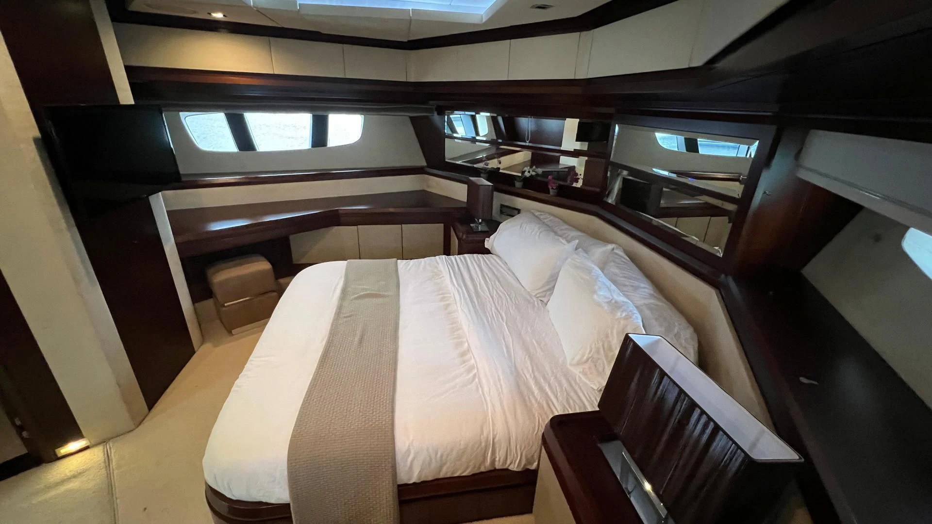 a room with a bed and a window aboard BT2 Yacht for Sale
