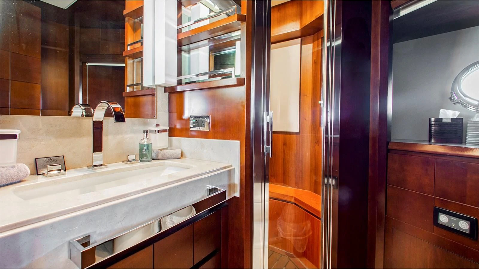 a bathroom with a sink and cabinets aboard BT2 Yacht for Sale