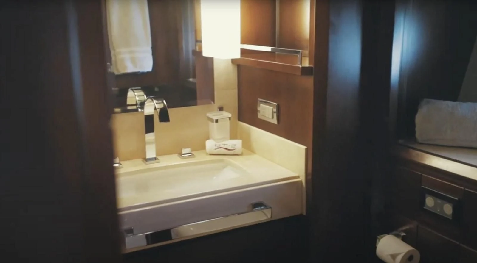 a bathroom with a sink and a mirror aboard BT2 Yacht for Sale