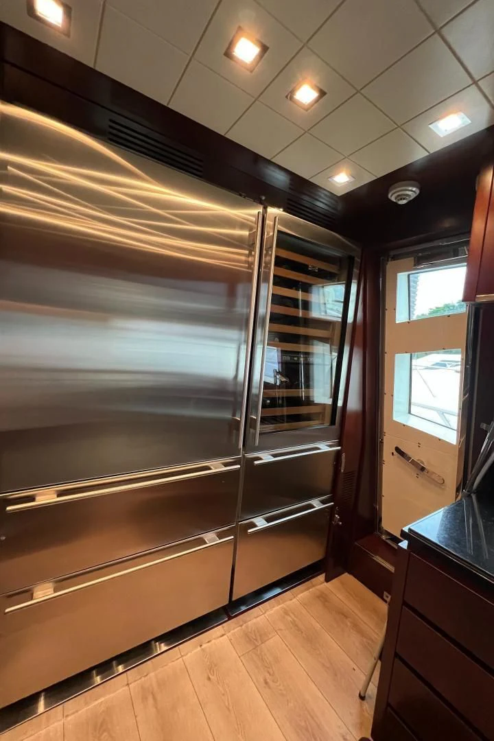 a room with a glass door aboard BT2 Yacht for Sale