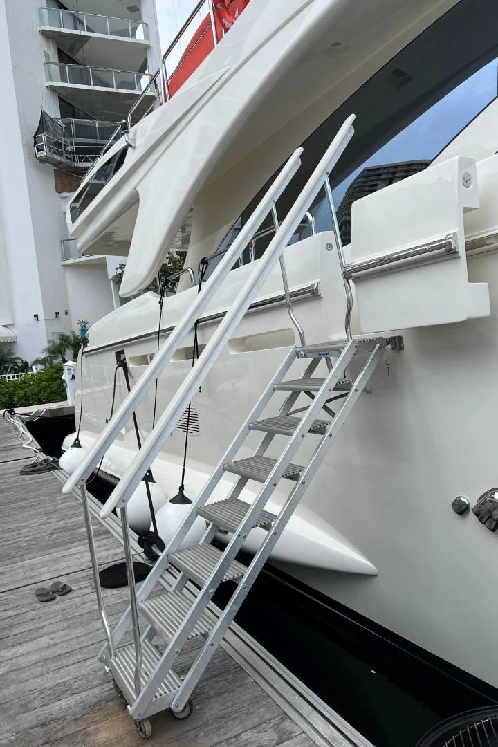 a white staircase outside aboard BT2 Yacht for Sale