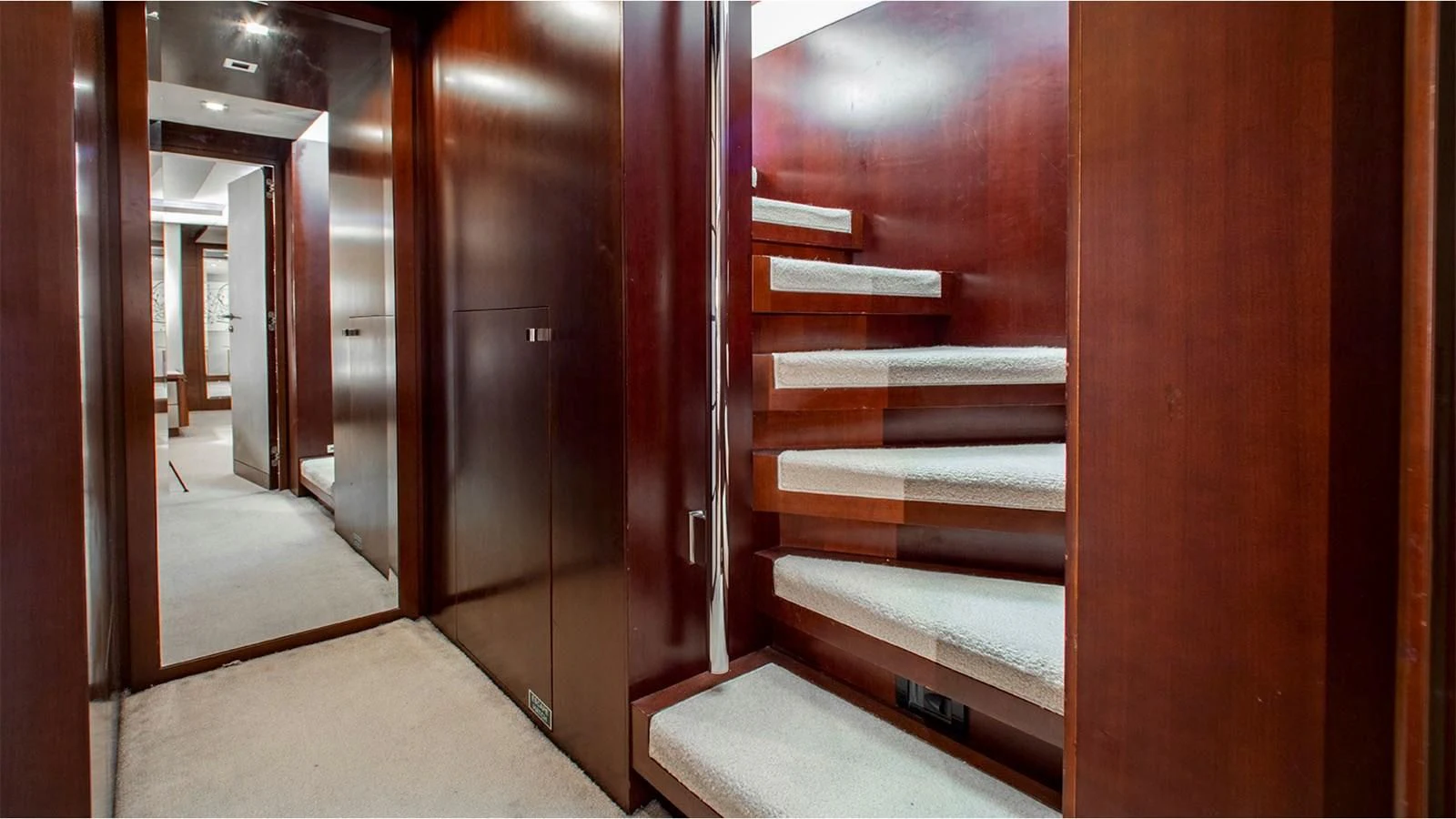 a room with wooden doors aboard BT2 Yacht for Sale