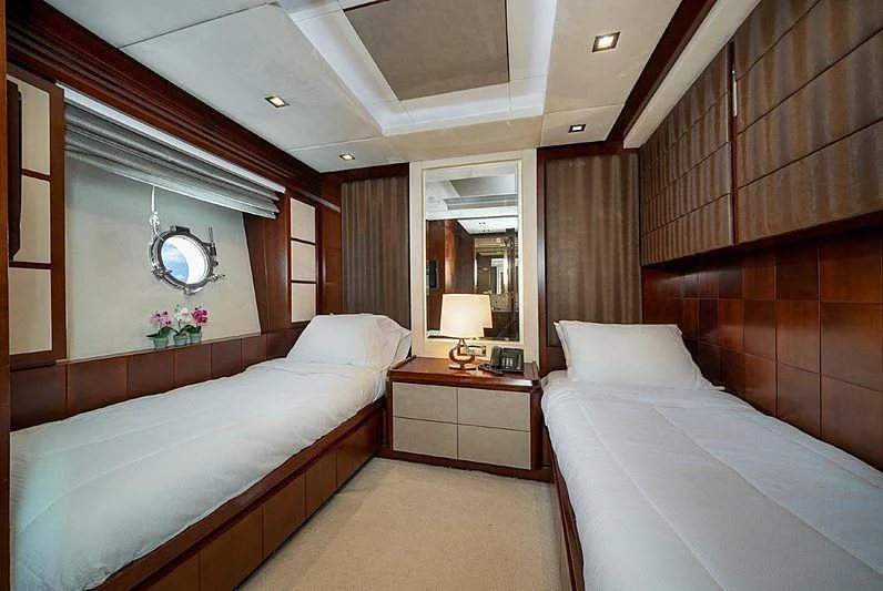 a room with two beds aboard BT2 Yacht for Sale