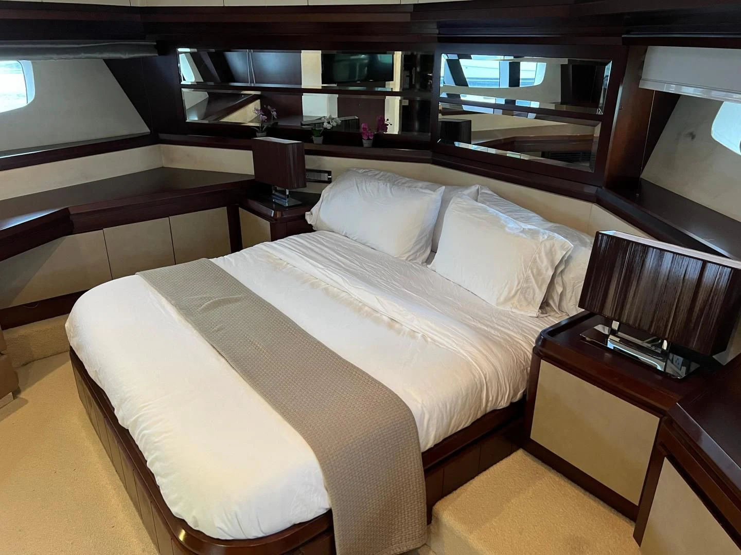 a bed with white sheets aboard BT2 Yacht for Sale