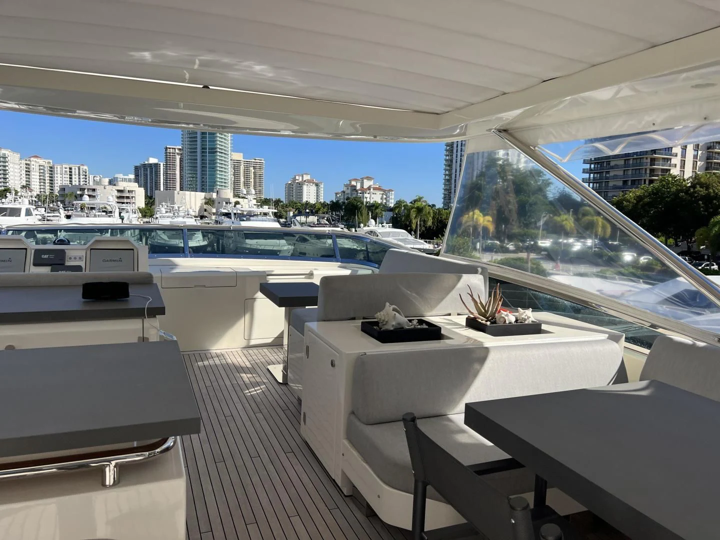 a room with a view of a city and a body of water aboard BT2 Yacht for Sale