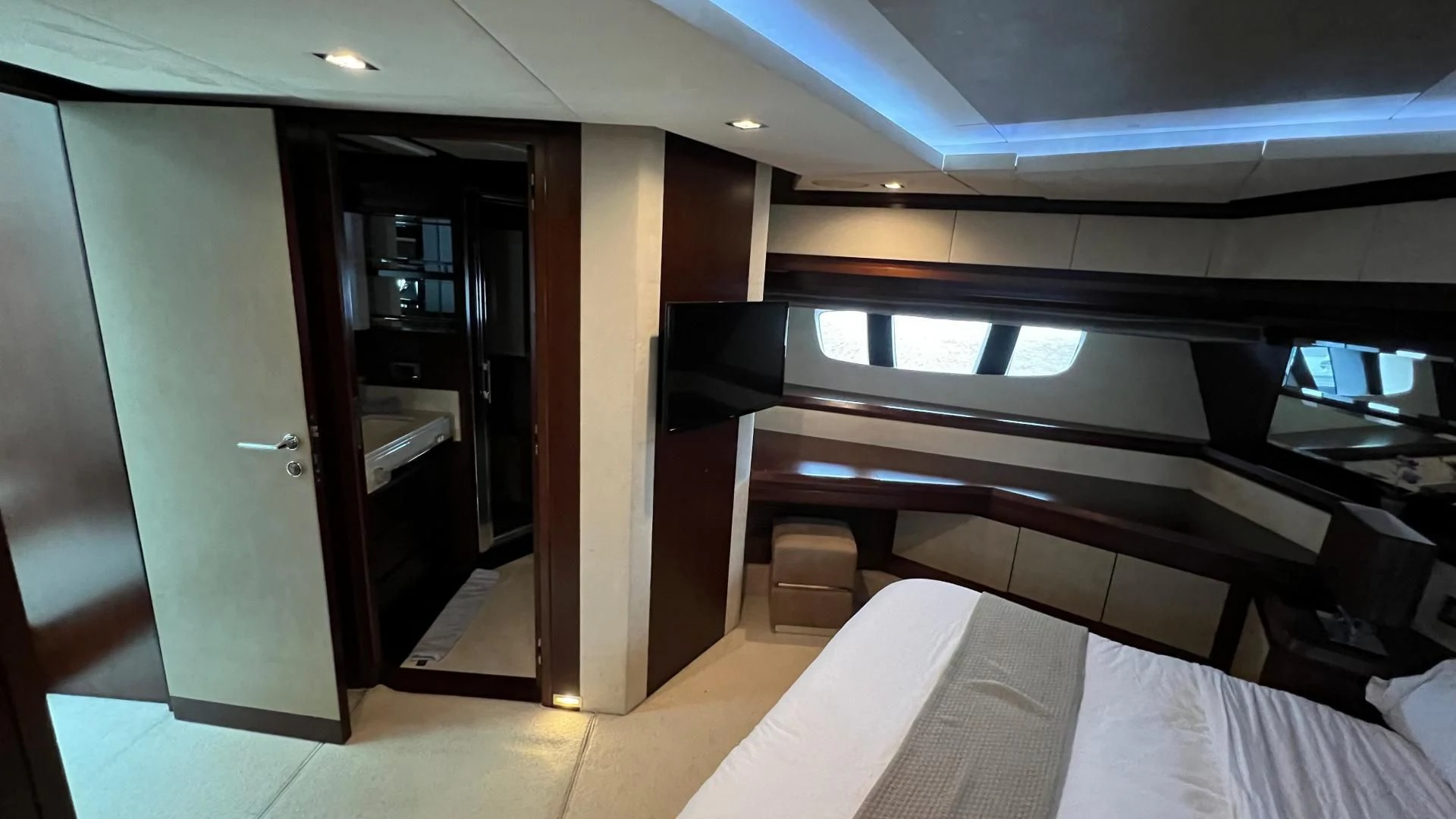 a room with a bed and a door aboard BT2 Yacht for Sale