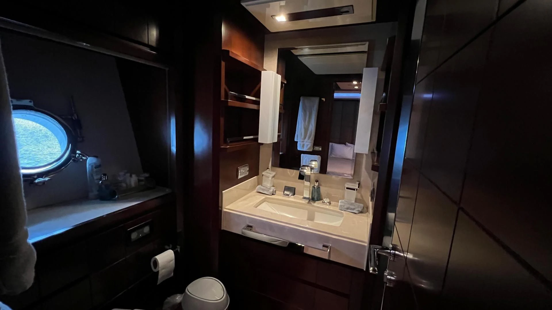 a bathroom with a sink and a mirror aboard BT2 Yacht for Sale