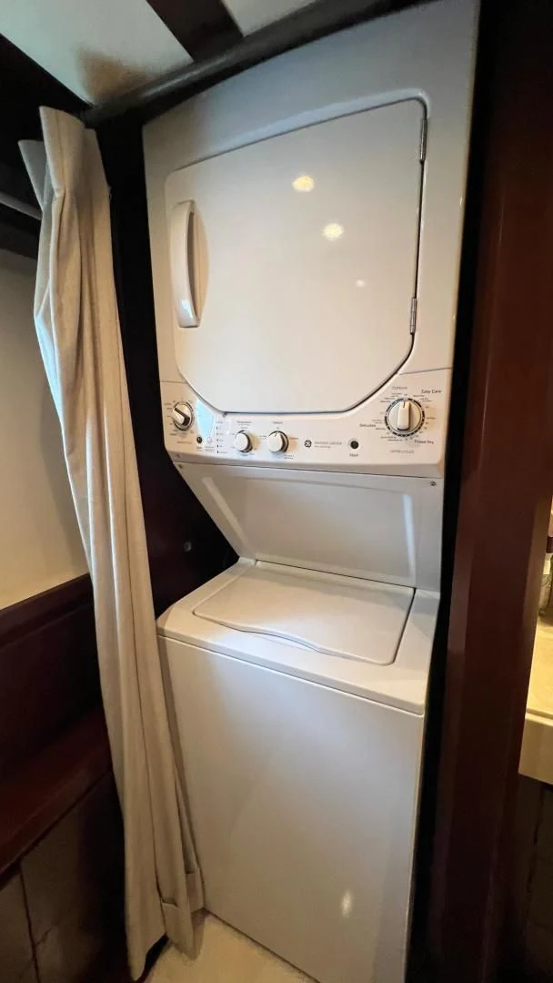 a washing machine in a room aboard BT2 Yacht for Sale