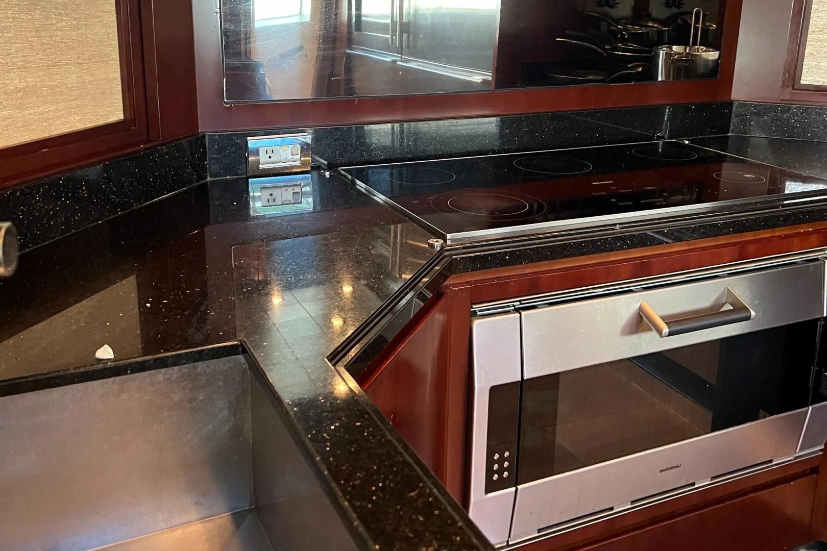 a kitchen with a stove and oven aboard BT2 Yacht for Sale