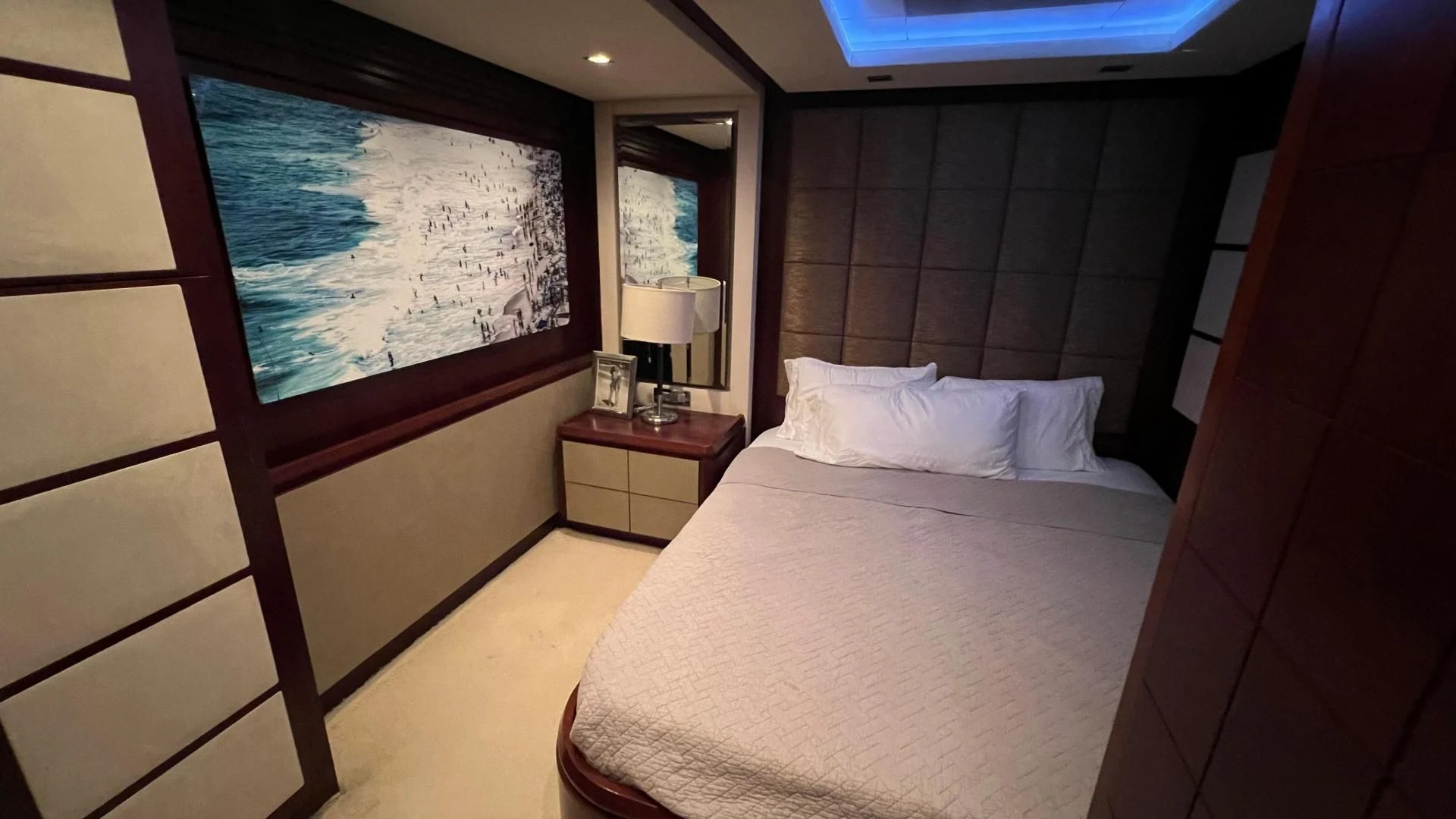 a room with a bed and a window aboard BT2 Yacht for Sale