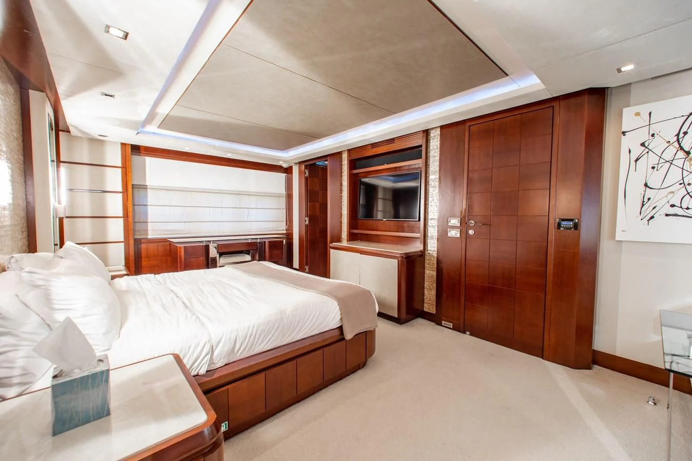 a room with a bed and a desk aboard BT2 Yacht for Sale