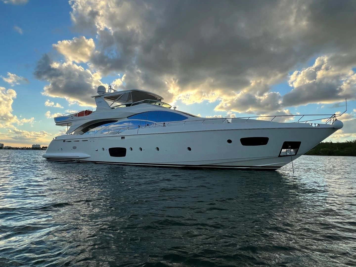 a white yacht on the water aboard BT2 Yacht for Sale