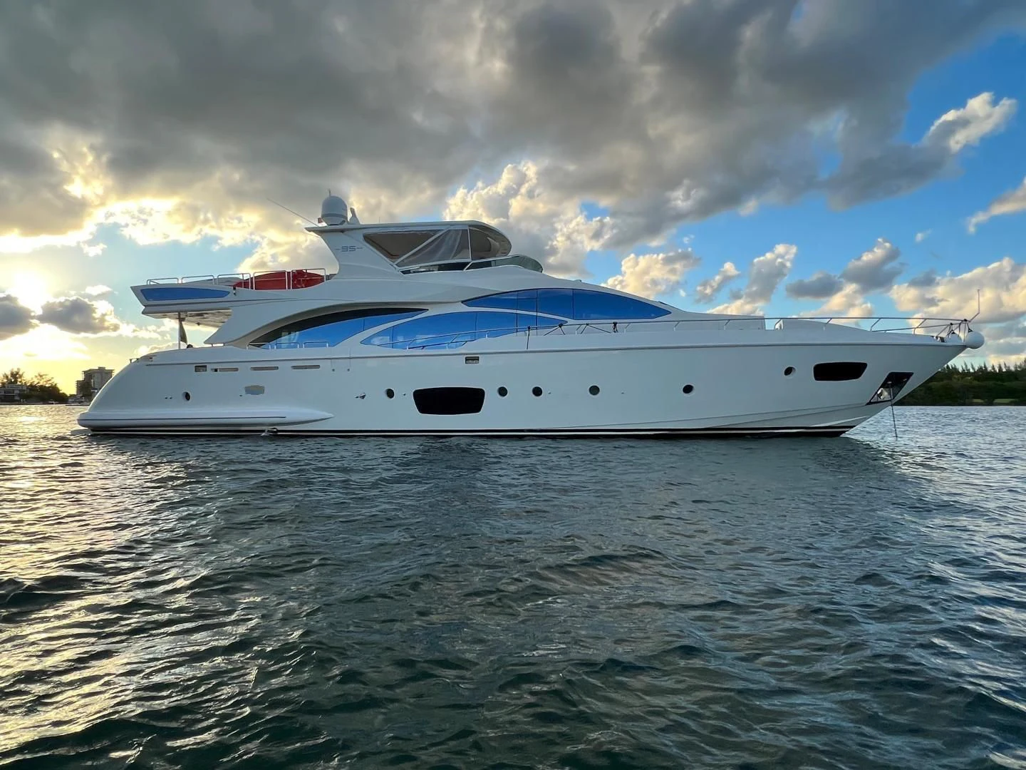 a white yacht on water aboard BT2 Yacht for Sale