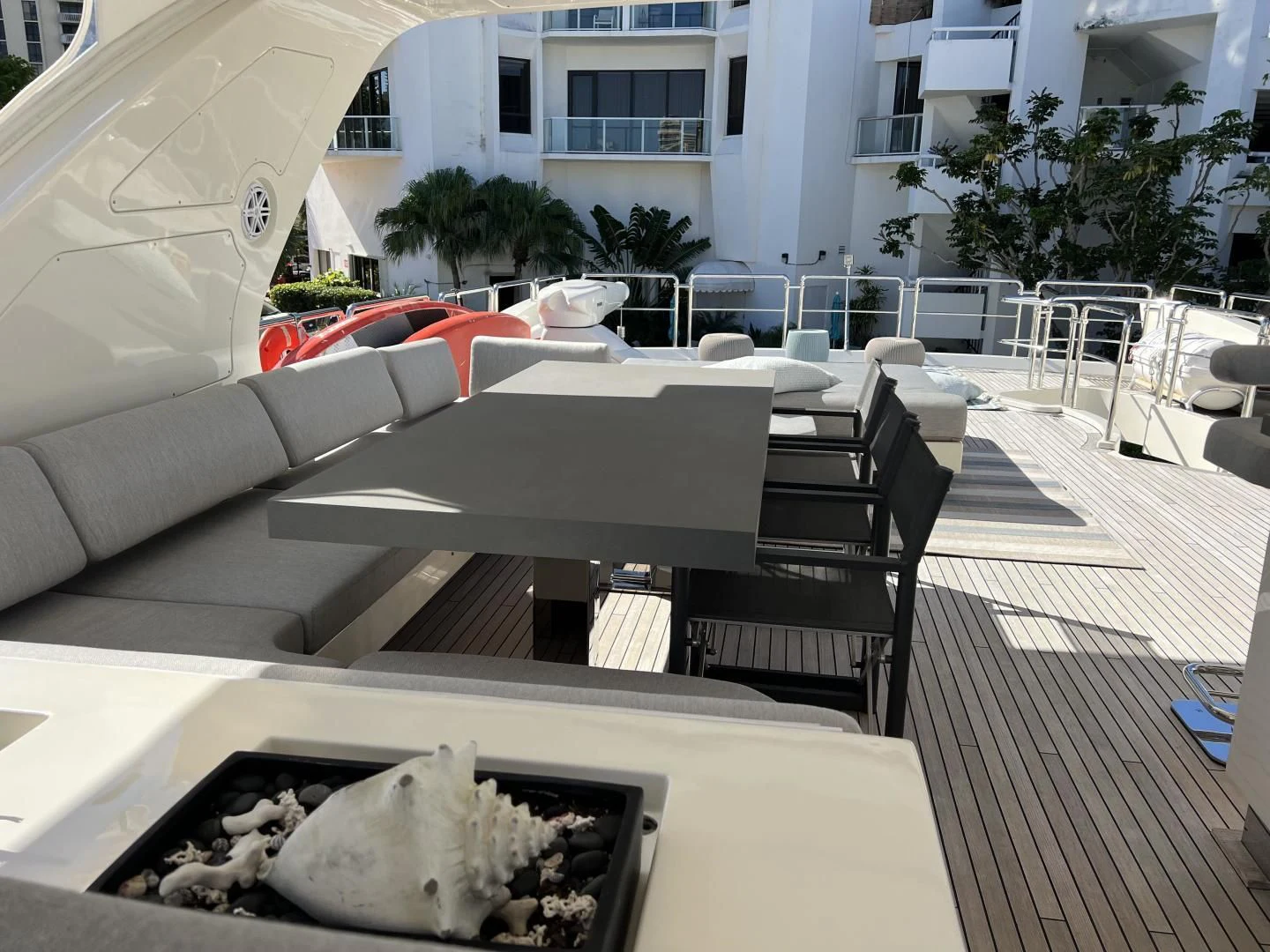 a table and chairs outside a building aboard BT2 Yacht for Sale