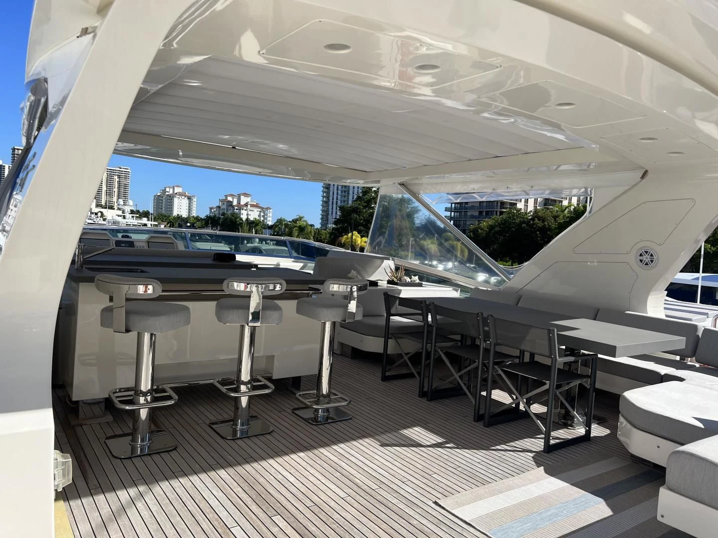 a room with tables and chairs aboard BT2 Yacht for Sale