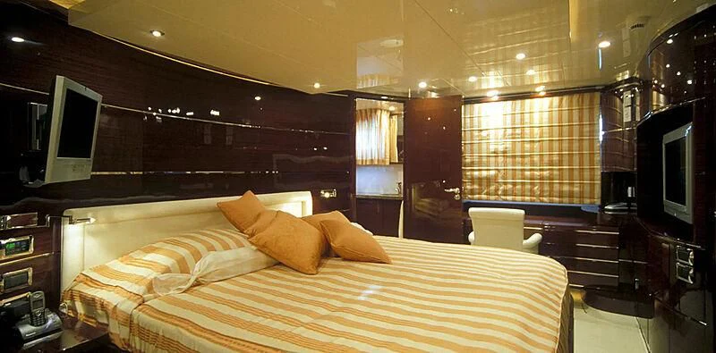 a bed in a room aboard CONTESSINA Yacht for Sale