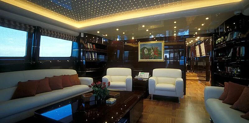 a living room with a large window aboard CONTESSINA Yacht for Sale