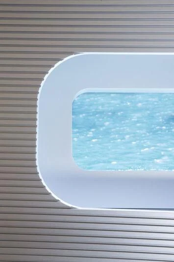 a window with a view of the earth from the window aboard UNFURLED Yacht for Sale